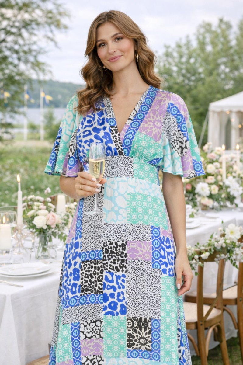 Gisela Klänning – Multi Leo/Flower - Bild 2